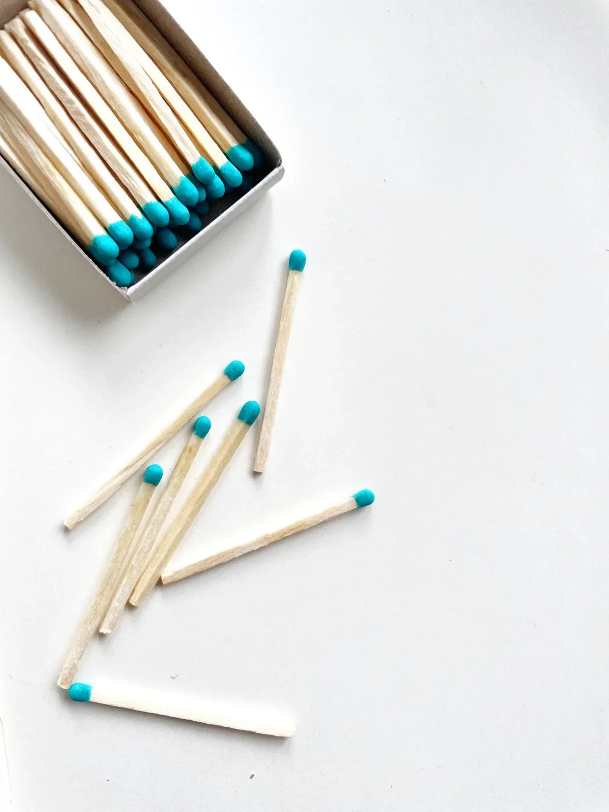 Turquoise-colored phosphorus matches